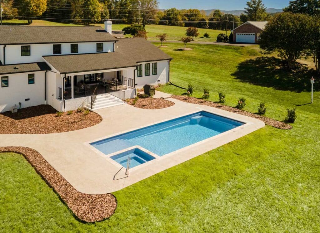 Astoria 12 Latham fiberglass pool with spa, 12 ft by 28 ft